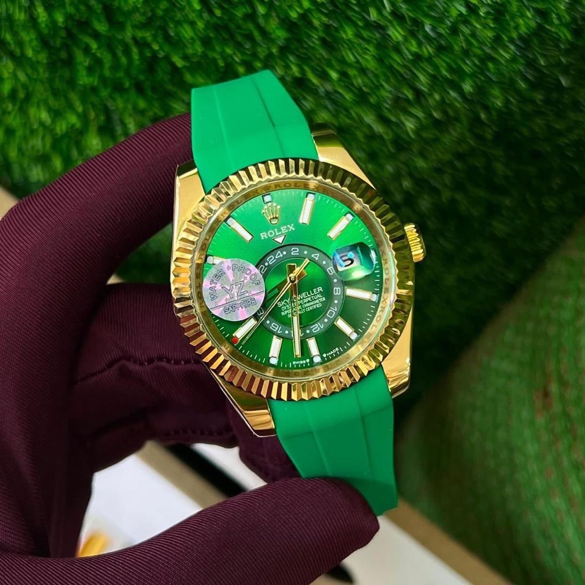 Rolex green and gold color watch 