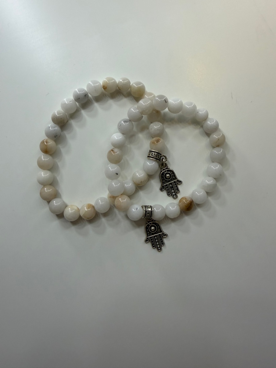 Handmade gemstone bracelets with charms