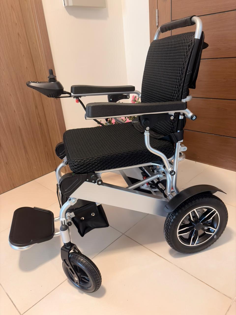 Electric wheelchair with joystick control
